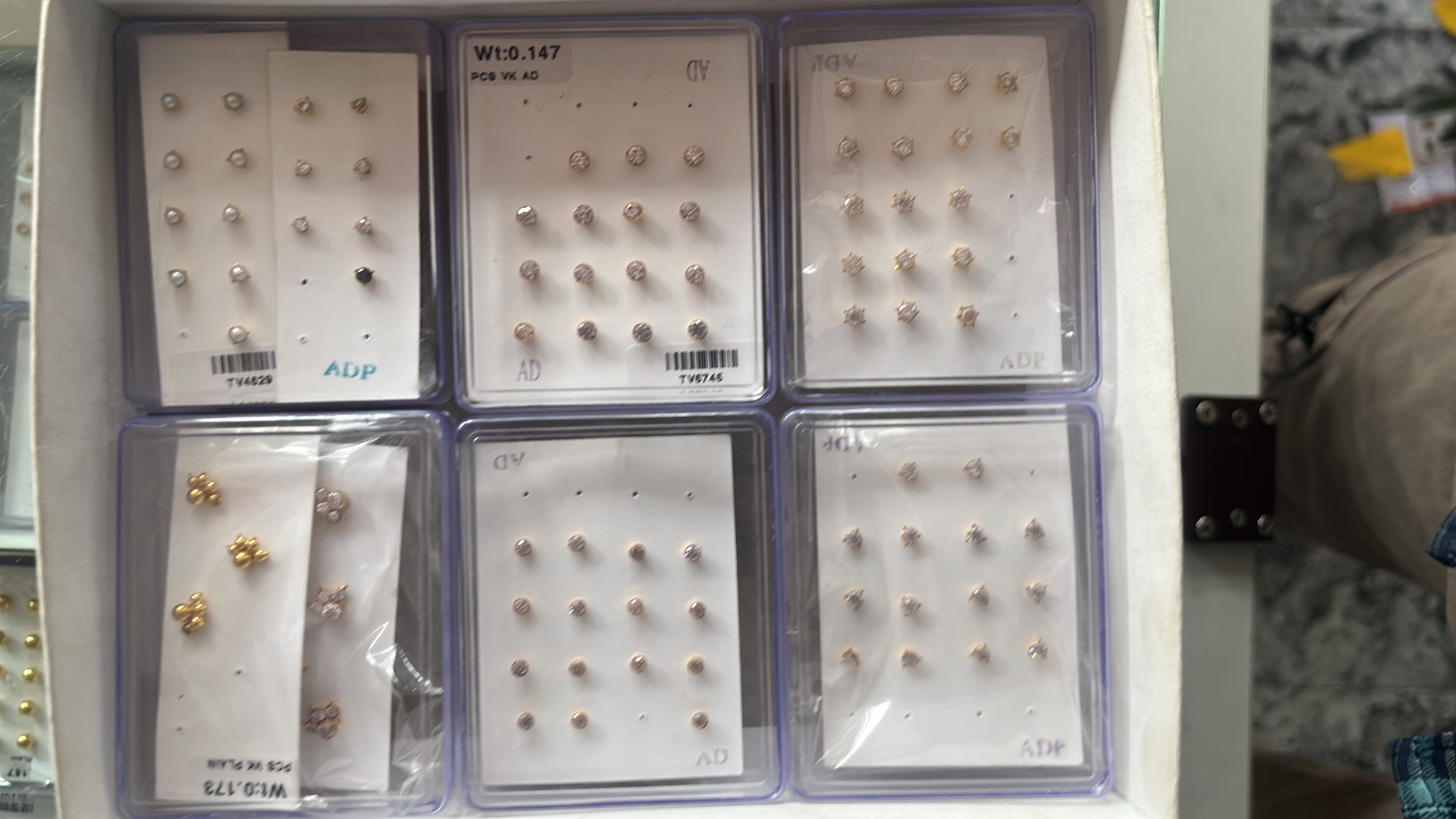 Nose pins and gold earrings two win