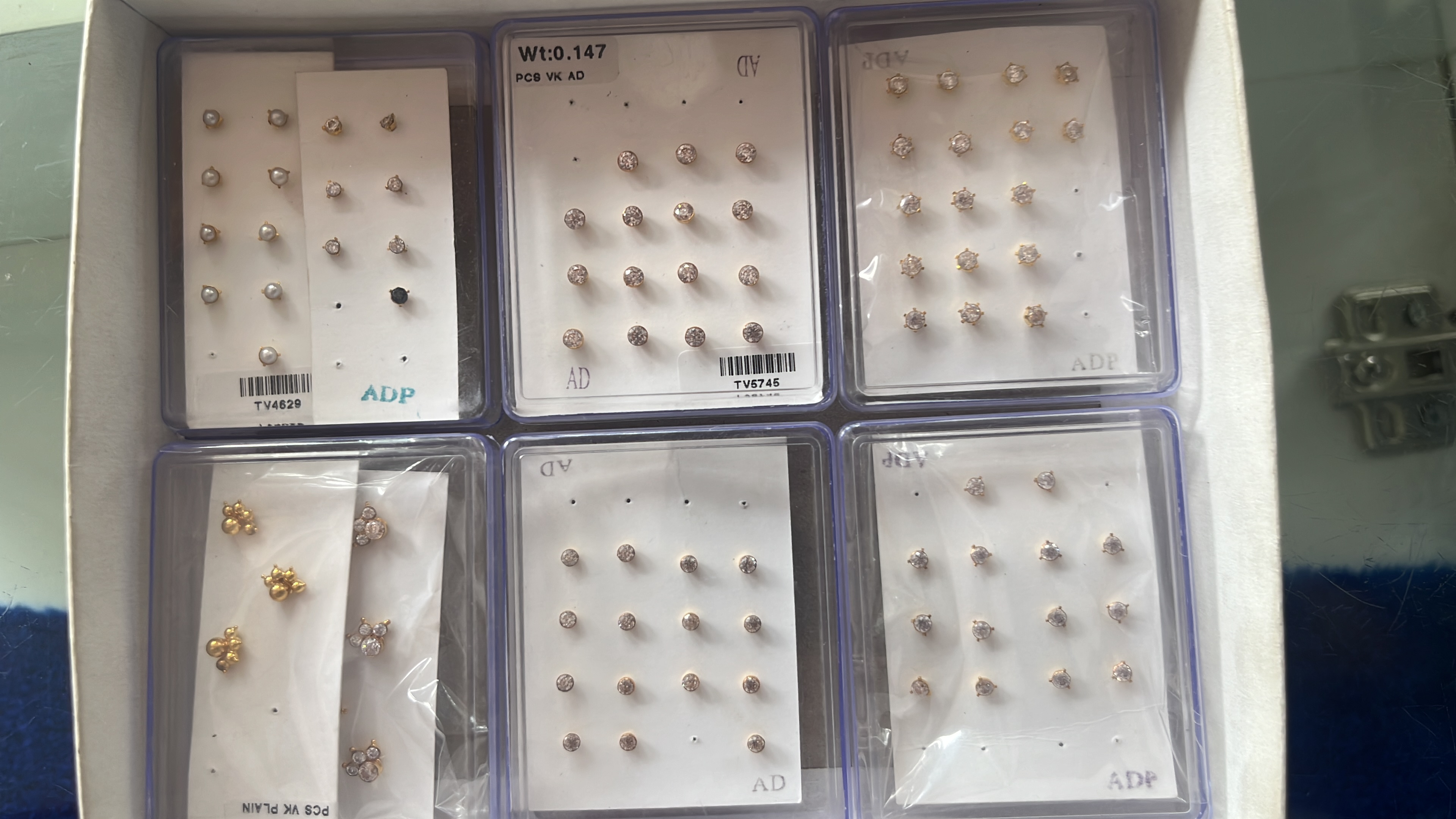 Nose pins and gold earrings two win