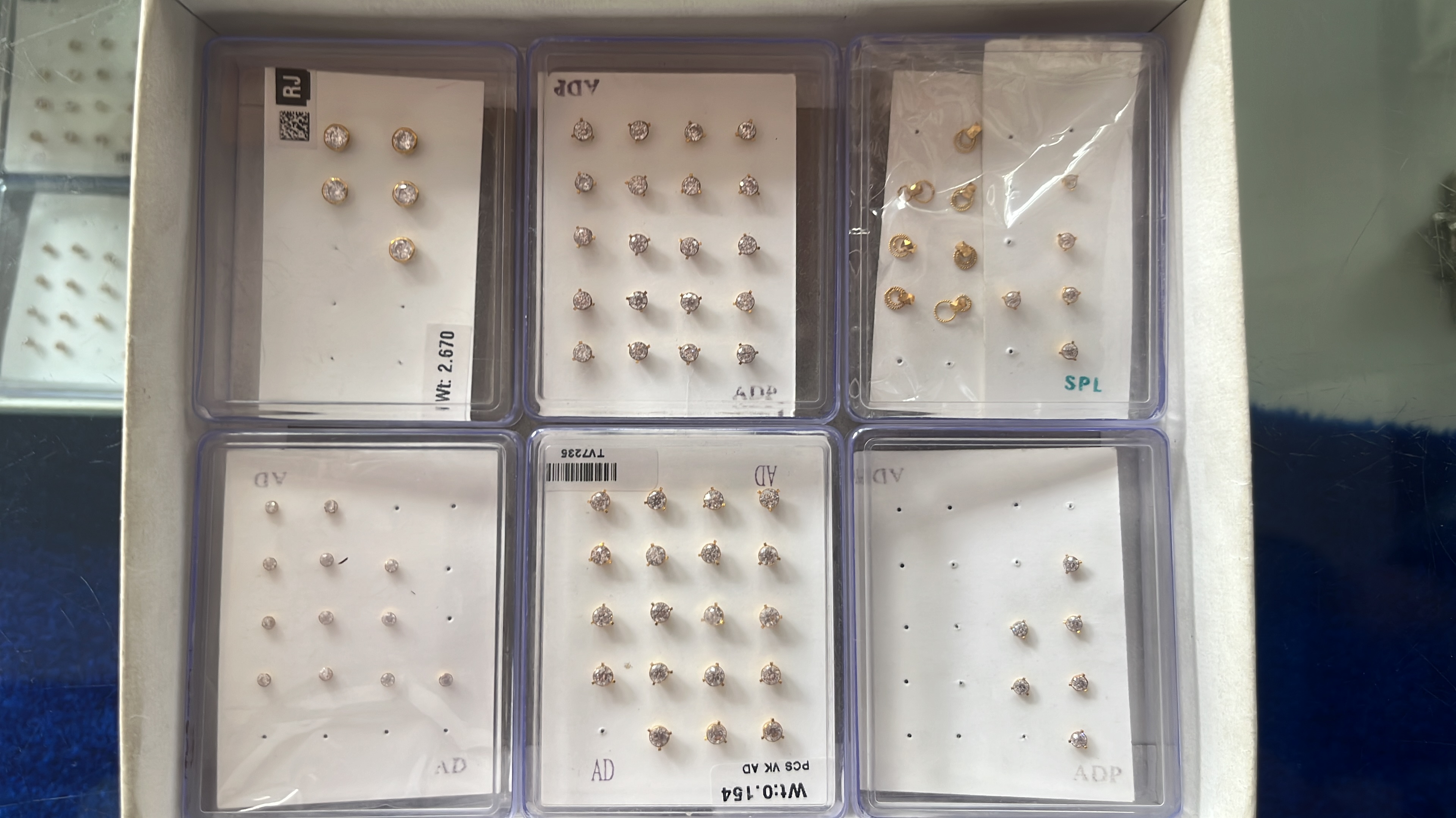 Nose pins and gold earrings two win