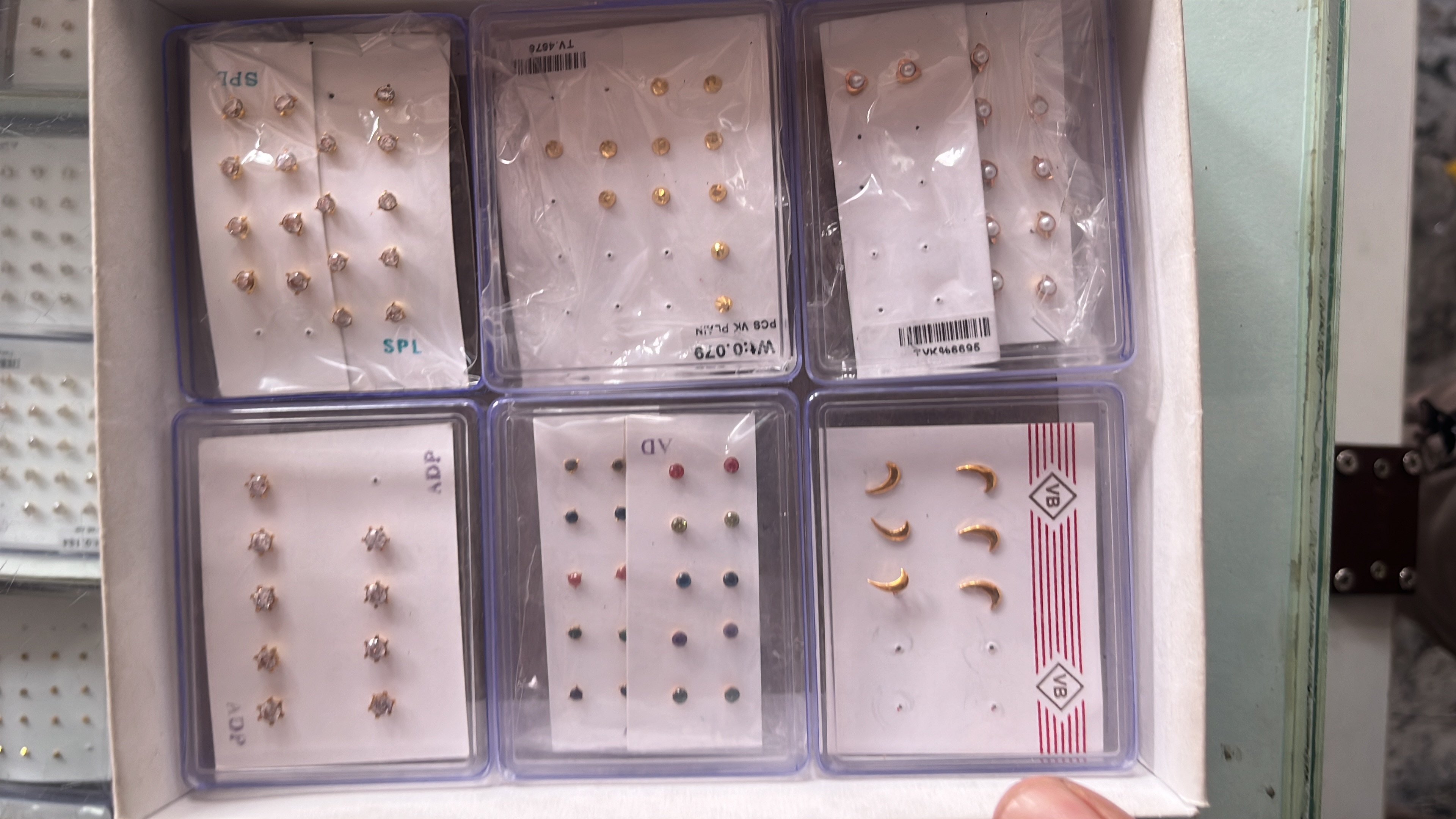 Nose pins and gold earrings two win