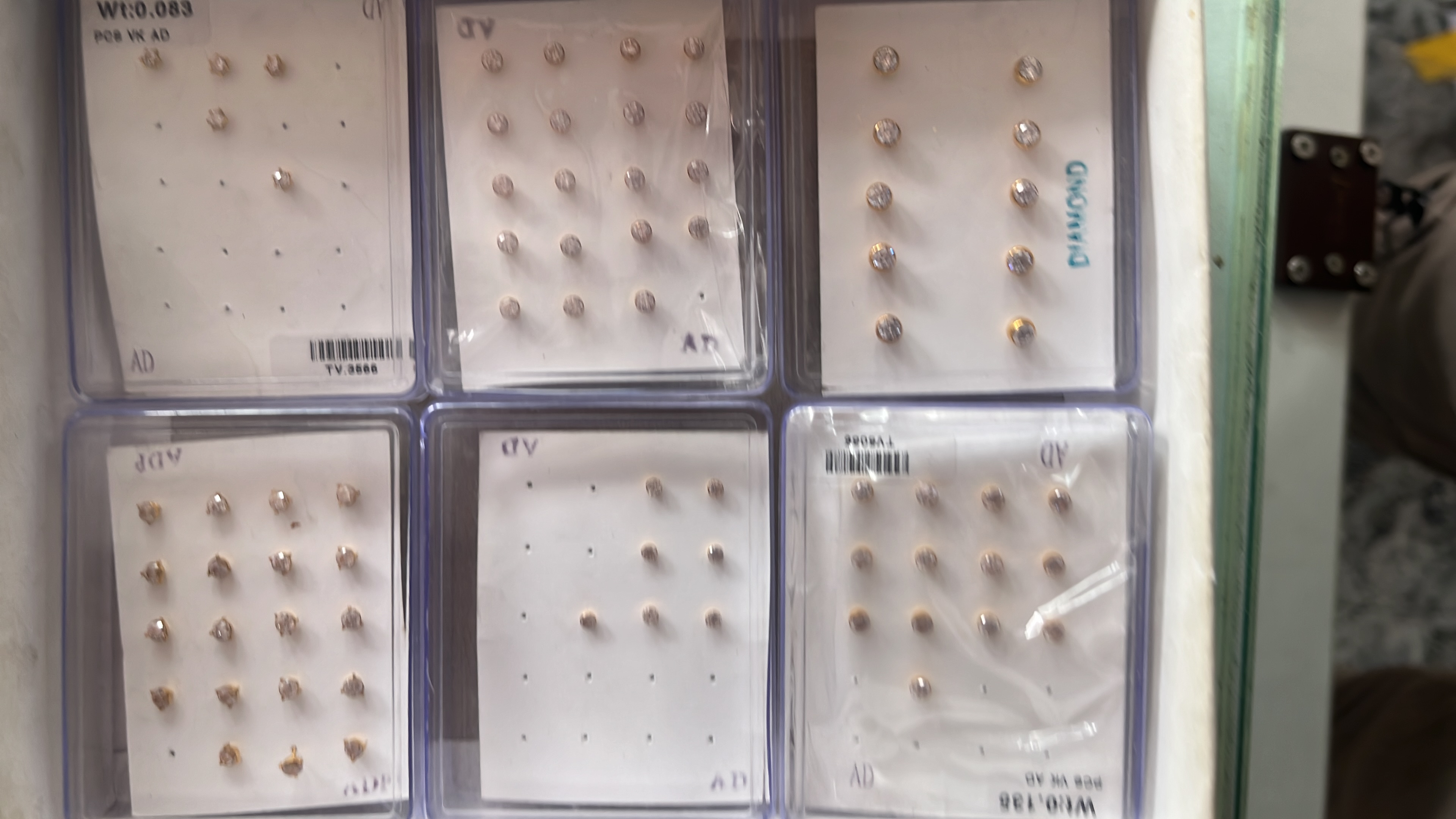 Nose pins and gold earrings two win